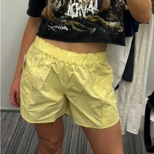 FREE PEOPLE MOVEMENT YELLOW CARGO SHORTS